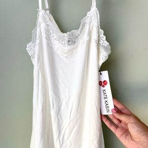 Kate Kasin brand. White lace top, hasn’t been worn, or washed yet! 😊